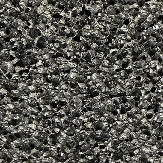 Open-cell rubber foam structure showing interconnected pores